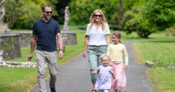 two young children walking with parents in Johnstown Castle Gardens