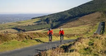 Wexford Cycle Routes and Trails. Two cyclists enjoying the scenic cycling routes in Ireland.