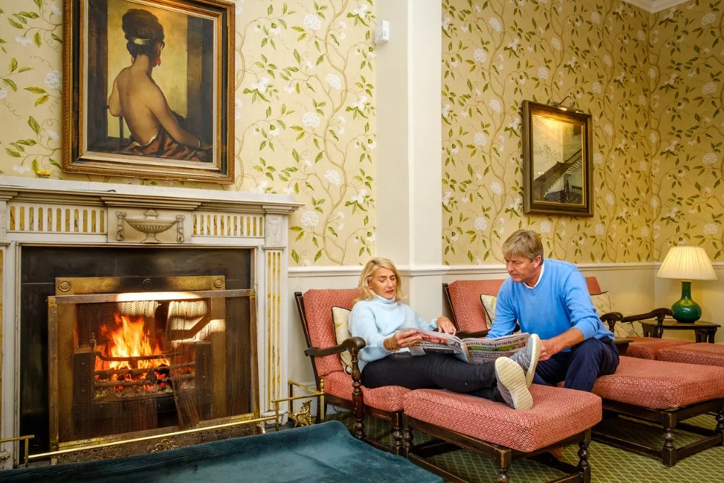 Relax by the fire at Kelly's Resort Hotel & Spa Rosslare